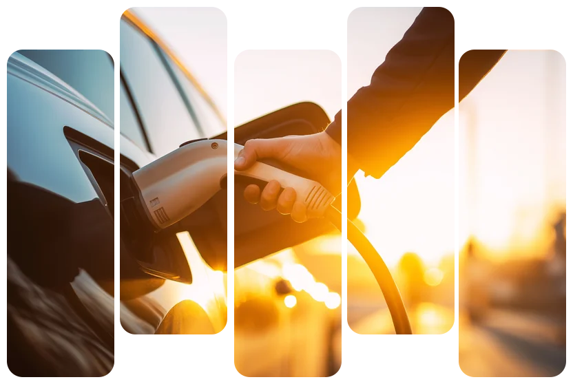 Main branchant le connecteur de recharge sur une voiture électrique